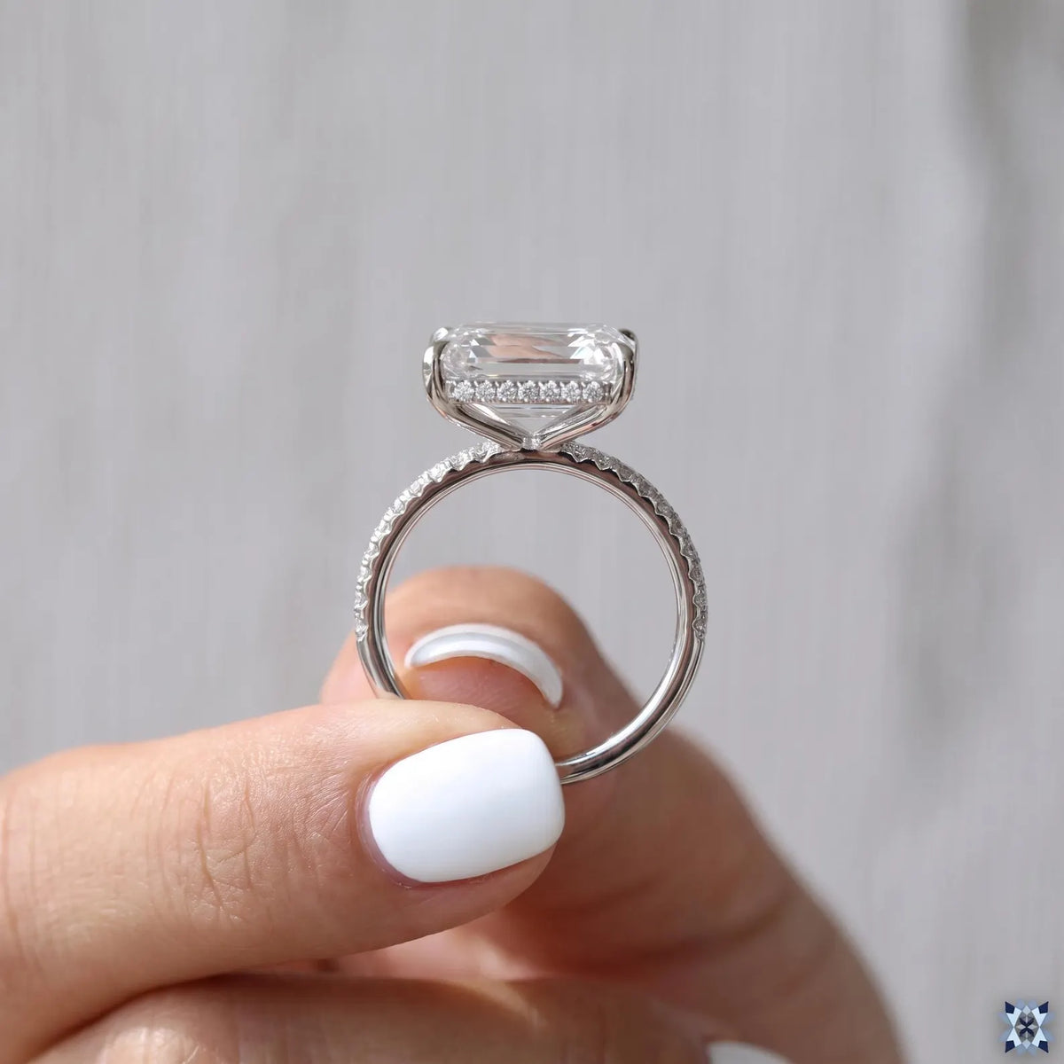 4-carat emerald cut moissanite engagement ring, 925 sterling silver, color D, VVS1 purity, GRA certified.