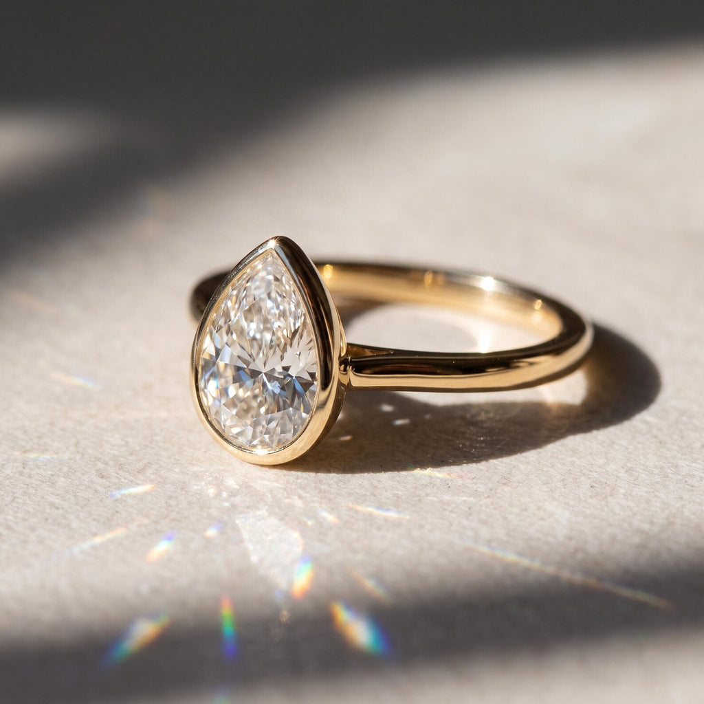 1 carat fantasy yellow pear synthetic diamond seal ring, 14 carat solid gold, IGI certified