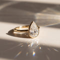 1 carat fantasy yellow pear synthetic diamond seal ring, 14 carat solid gold, IGI certified